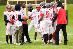 Reaction Technologies; Brandon Martin working with the Mount Clemens High School football team.