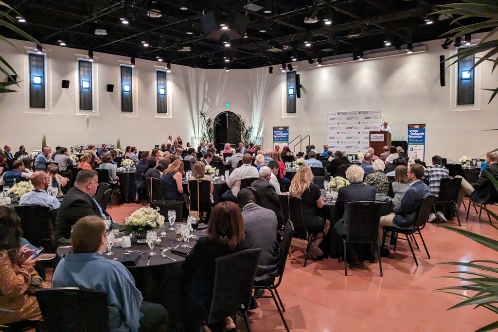 VIA Summit; attendees sitting at round tables at a past awards ceremony