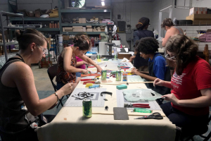 Students working at the original makerspace in the Dana Fine Arts Building of Agnes Scott College; photo by Nell Ruby.
