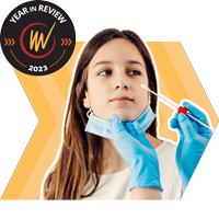  VentureWell Year in Review 2023; photo of woman about to be swabbed for a COVID-19 test 