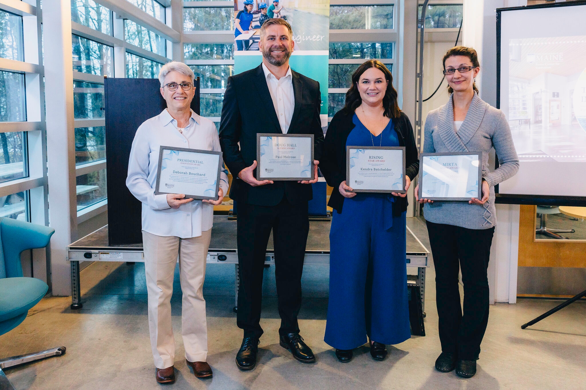 Kendra Batchelder of WAVED Medical (second from right) winning the Rising Star Award from the University of Maine’s 2024 Foster Center Innovation Awards.